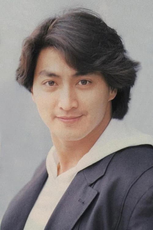 Фото 何家勁